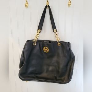 Michael Kors black genuine leather purse with gold chain
